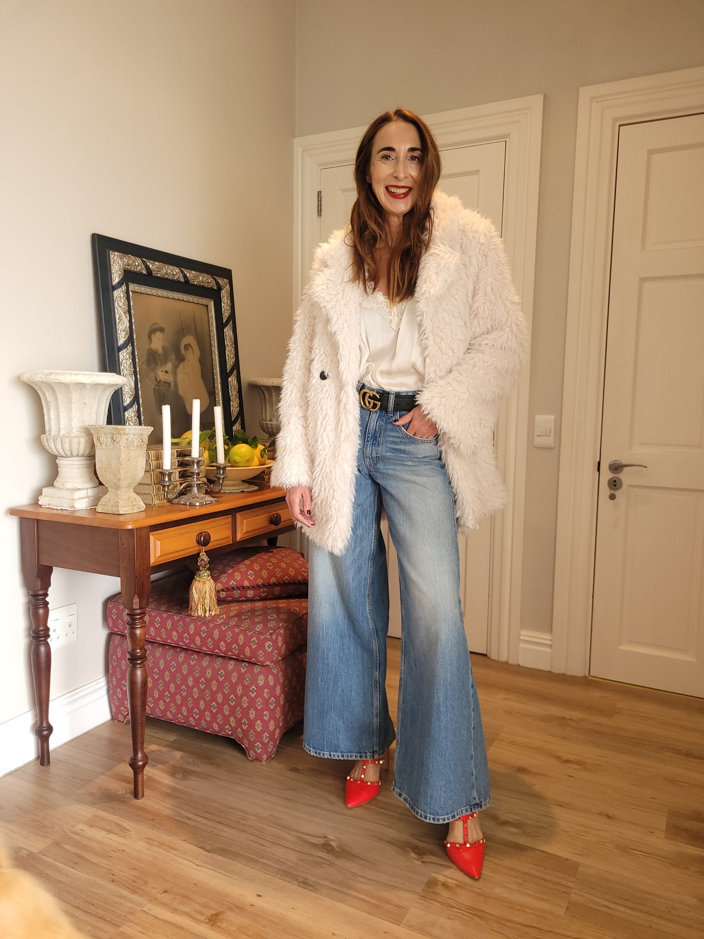 Faux fur jacket with side pockets.