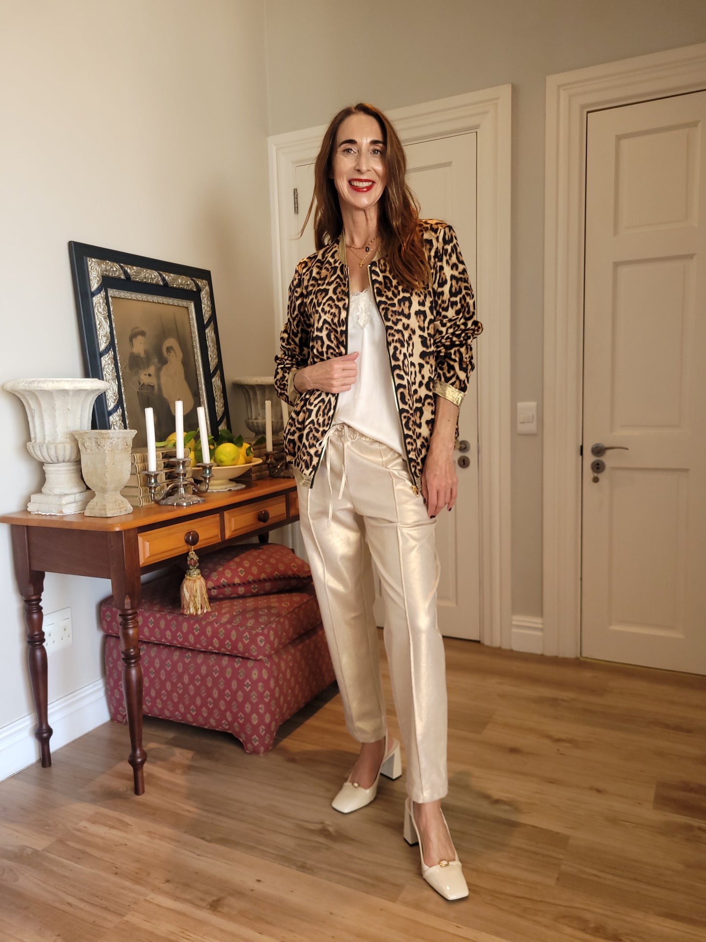 Leopard print zipper style jacket with side pockets.