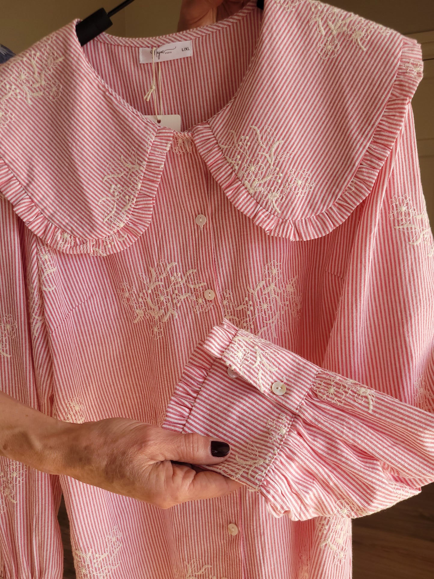 Red/white pinstripe shirt with Madeleine collar.