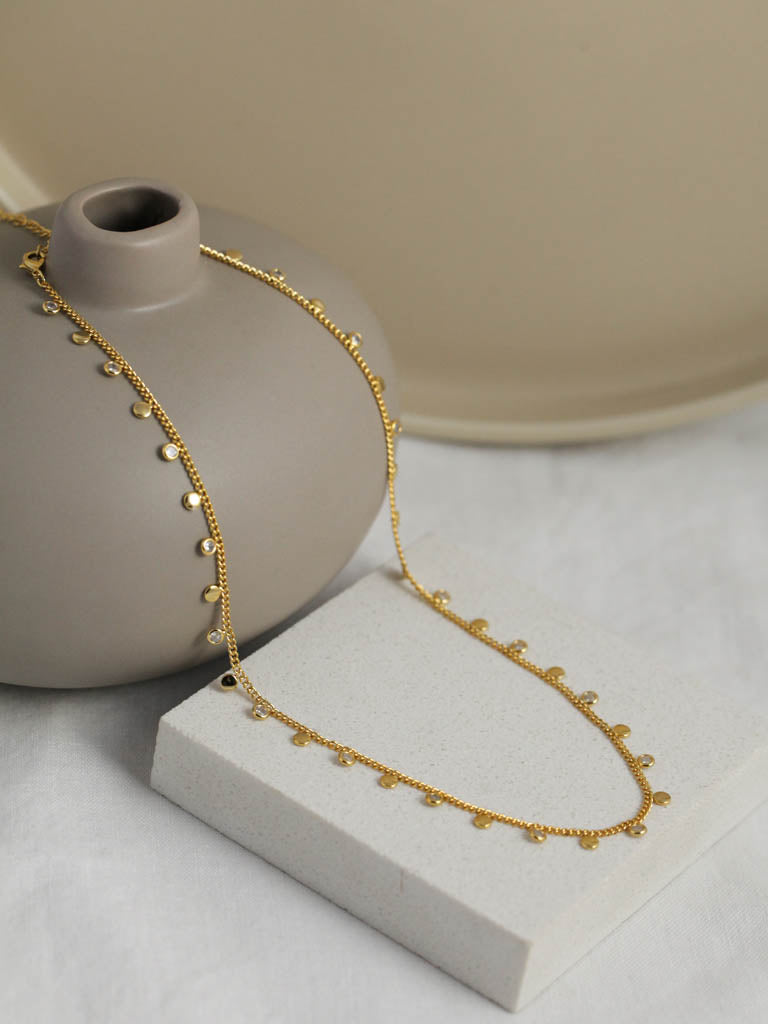 Crystal mini gold disc necklace