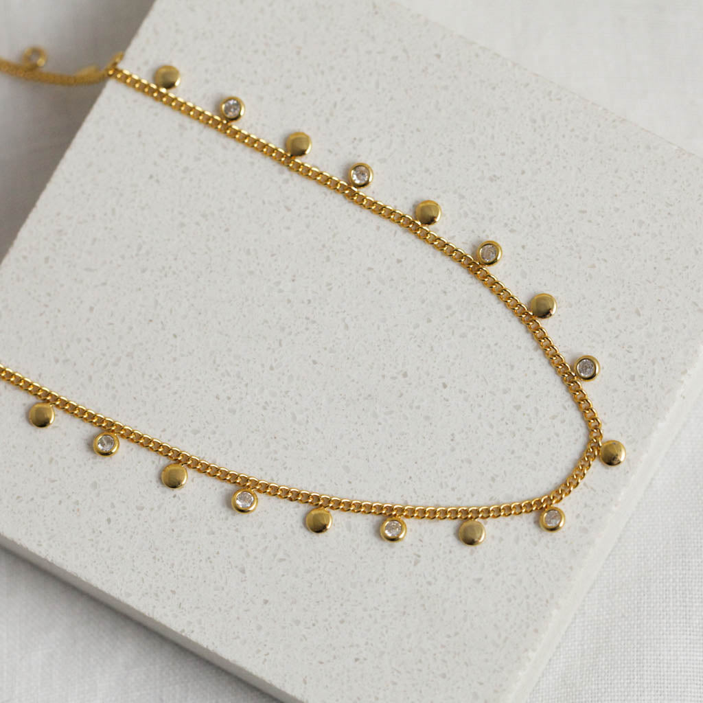 Crystal mini gold disc necklace