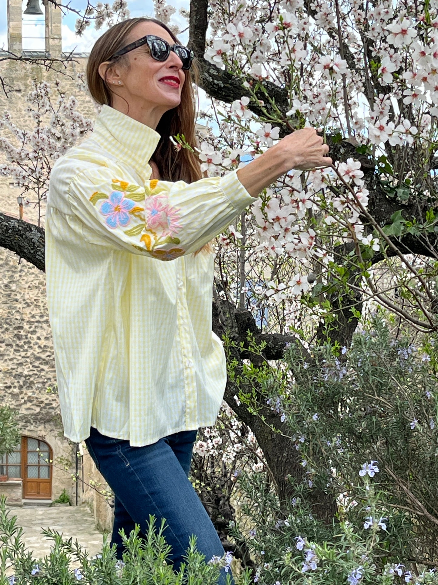 Button down oversize pale yellow/white gingham shirt with embroidered sleeves.