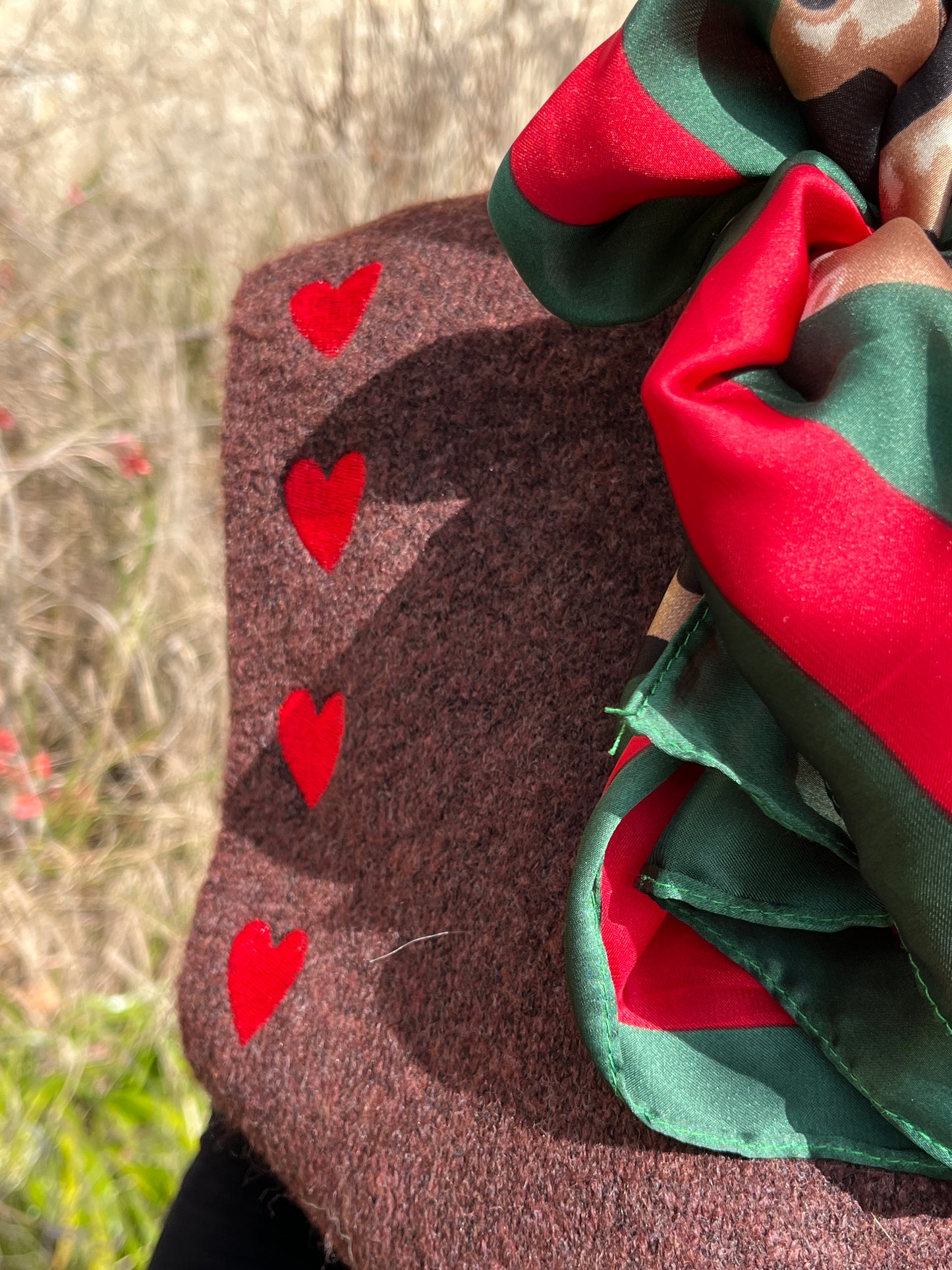 Supersoft chocolate WOOL blend pull-over knit with heart detail.