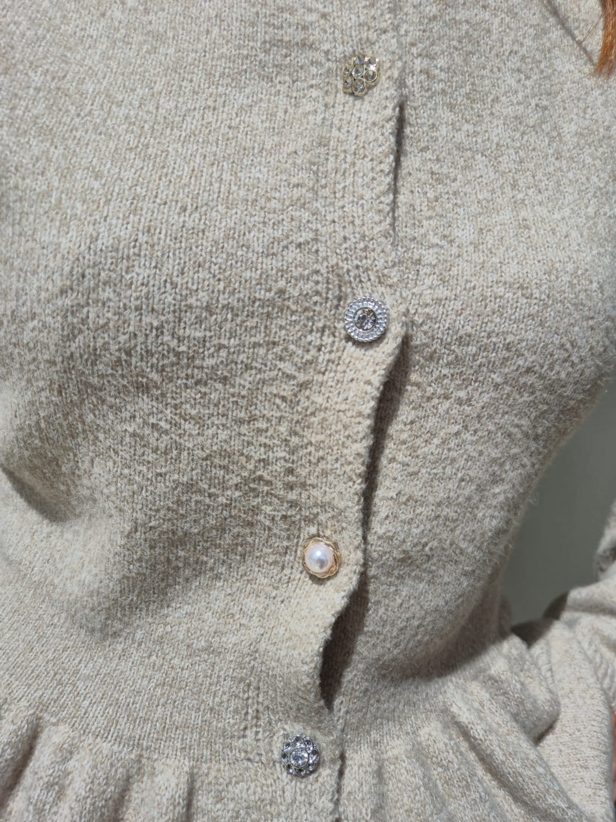 Peplum style knit.