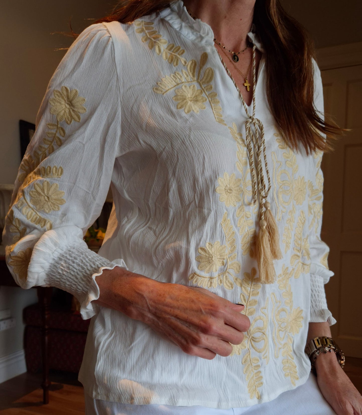 Blouse with stone embroidery detail and elasticated sleeve.