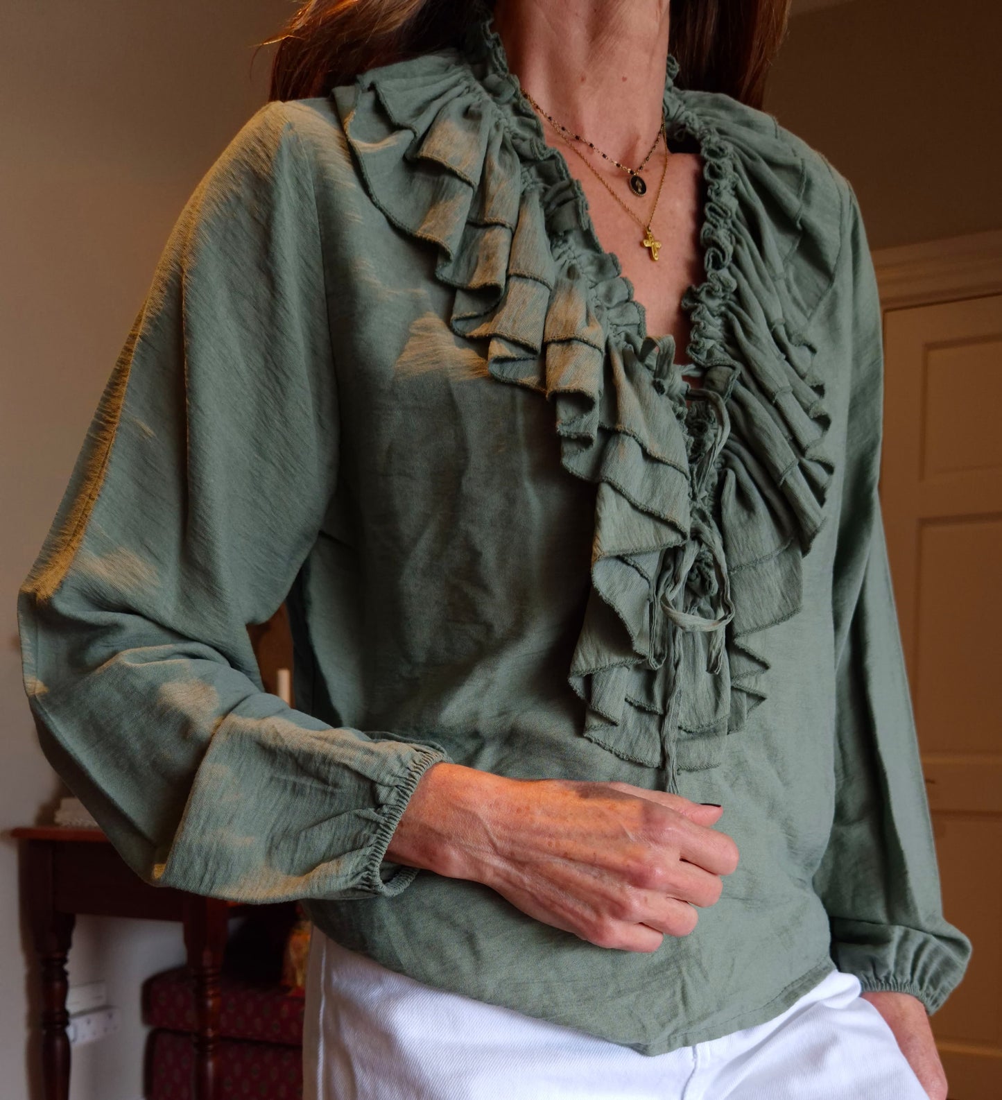 Blouse with elasticated cuff