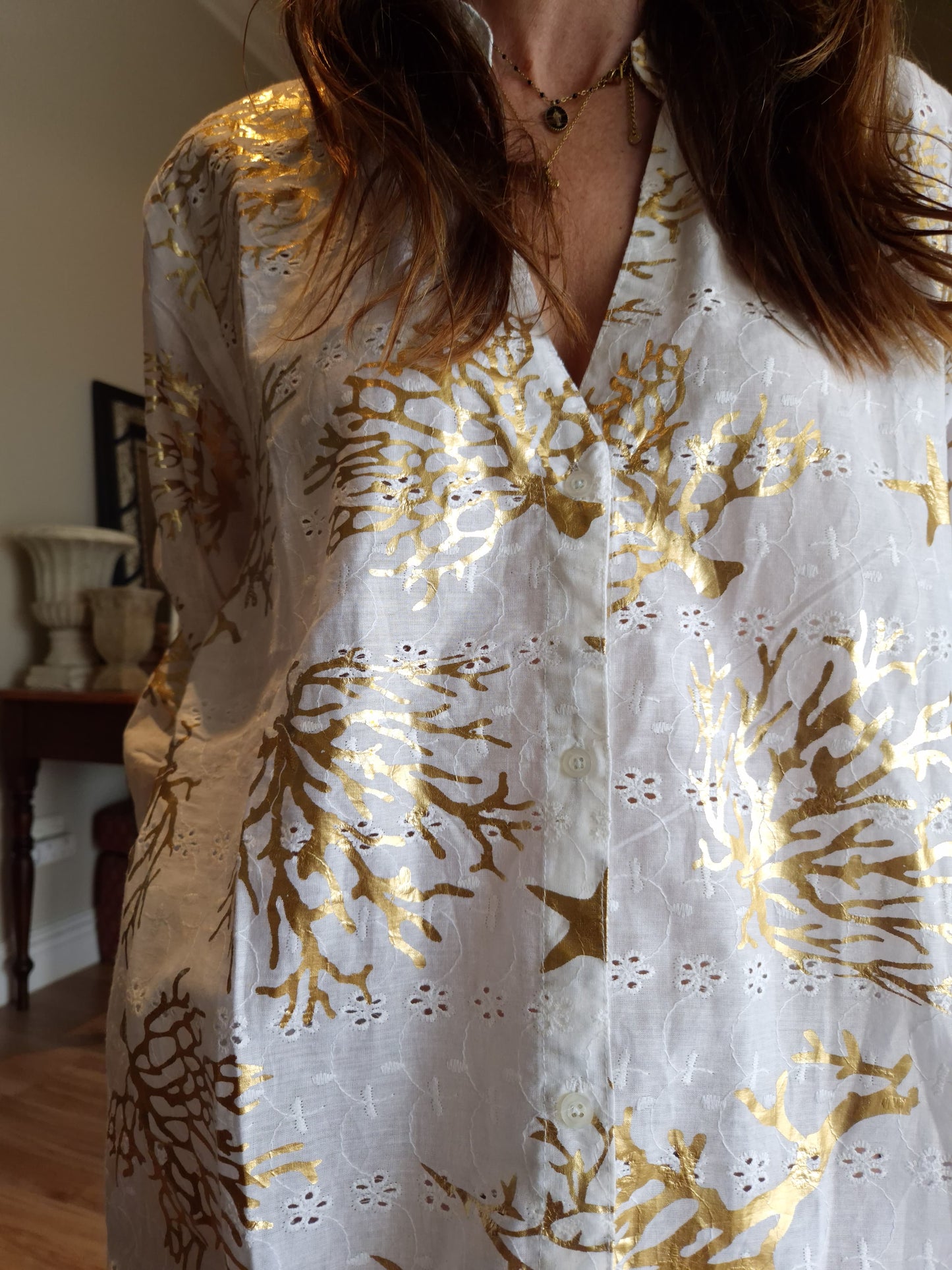 Anglaise beach dress with gold detail and side pockets
