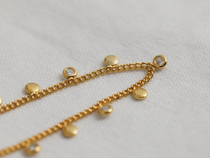 Crystal & mini gold disc bracelet