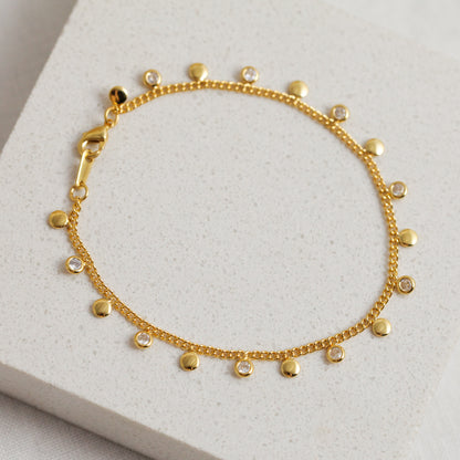 Crystal & mini gold disc bracelet