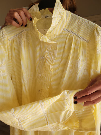 Yellow/white pinstripe button down shirt.