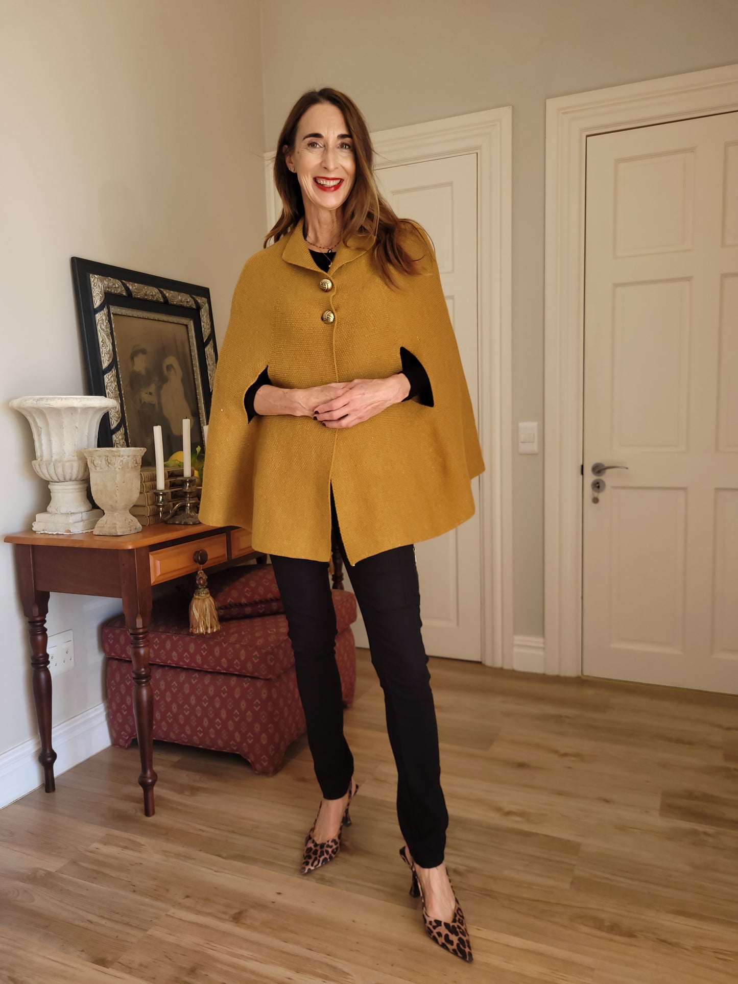 Mustard knitted cape.