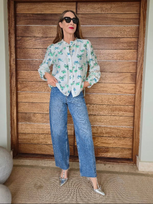 Cream floral blouse with gold thread detail and lace inserts.