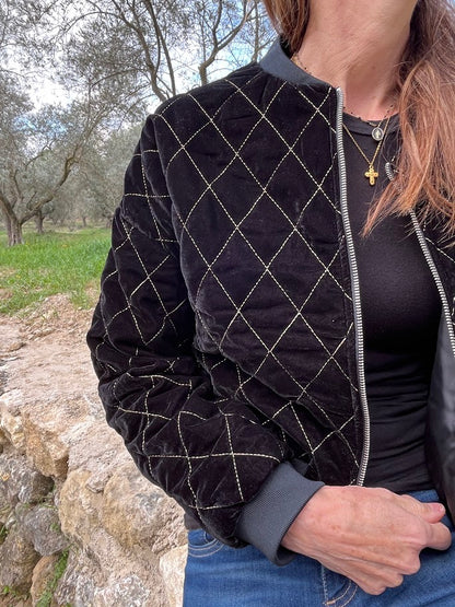 Fully lined velvet bomber jacket with gold thread detail, zip and elasticated cuff.