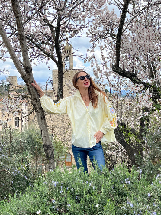 Button down oversize pale yellow/white gingham shirt with embroidered sleeves.