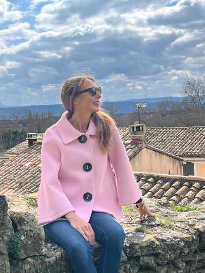 Button detail jacket with pockets in pink.