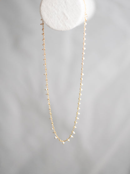 White bead necklace