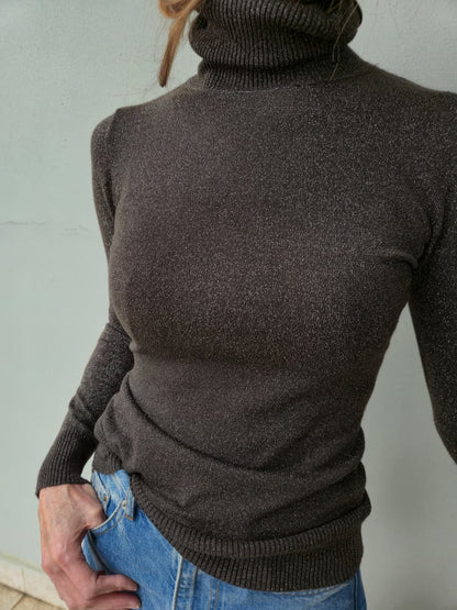 Chocolate poloneck with silver thread detail.