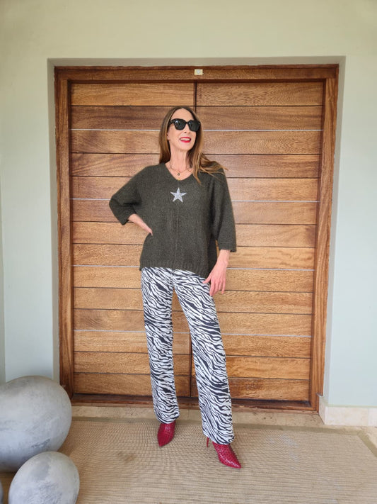 Olive green three quarter sleeve knit with bling stone detail.