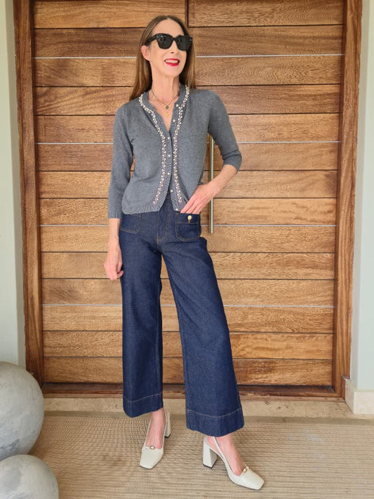 Three-quarter sleeve knit with pearl detail and buttons.