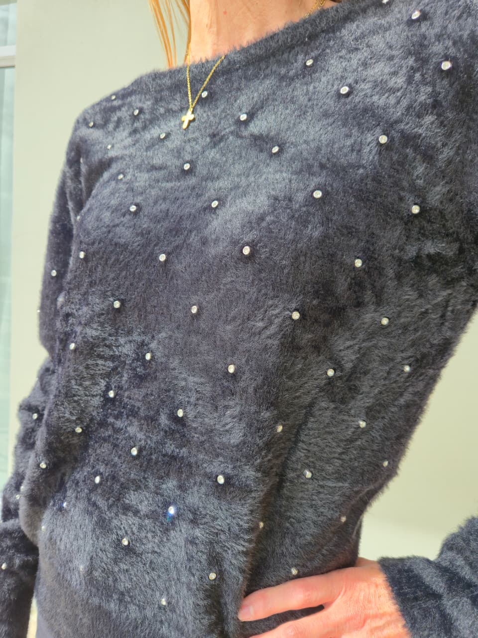 Supersoft black knit with bling detail.