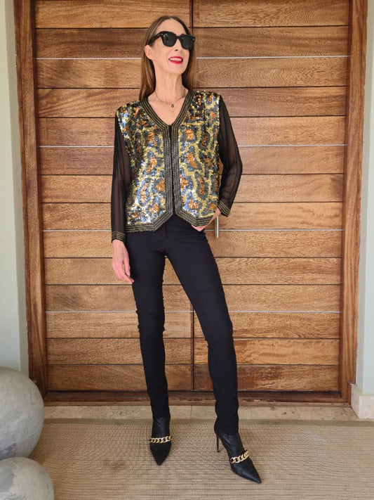 100% SILK and sequins fully lined jacket with chiffon sleeves and beaded detail.