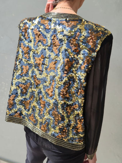 100% SILK and sequins fully lined jacket with chiffon sleeves and beaded detail.