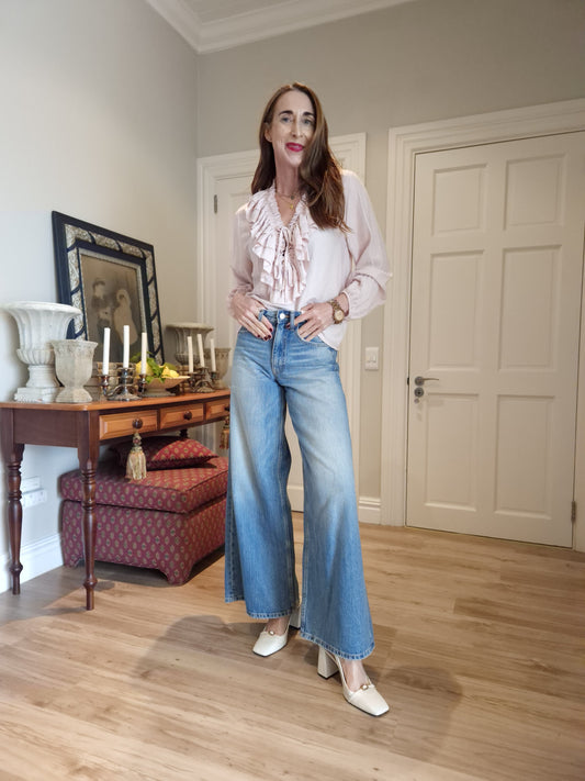 Blouse with elasticated cuff