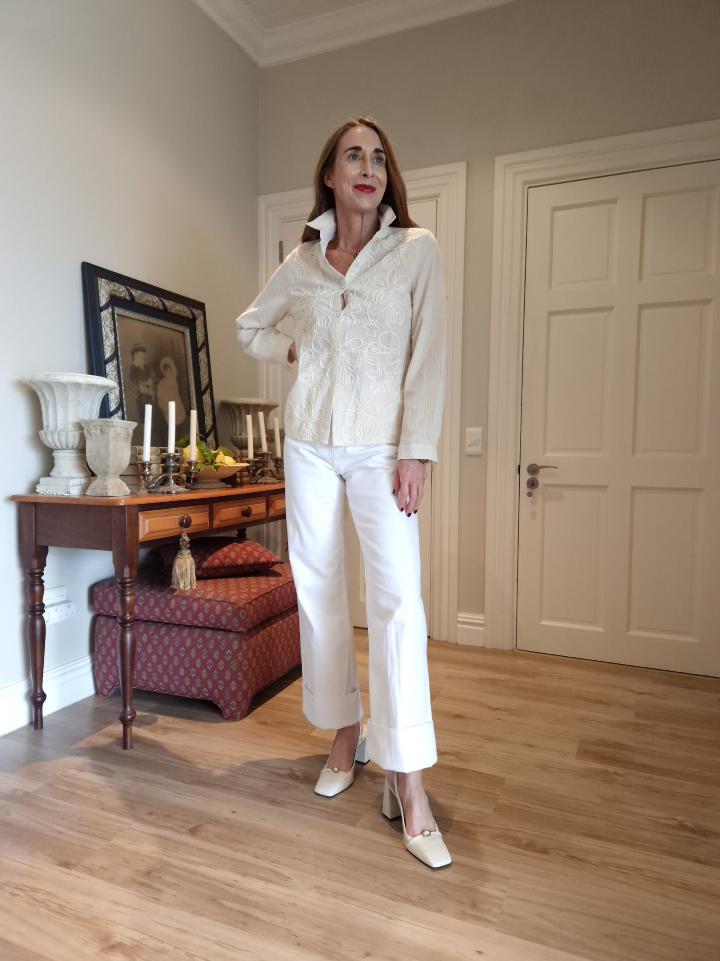 Long sleeve button down shirt with gold thread detail in the fabric.