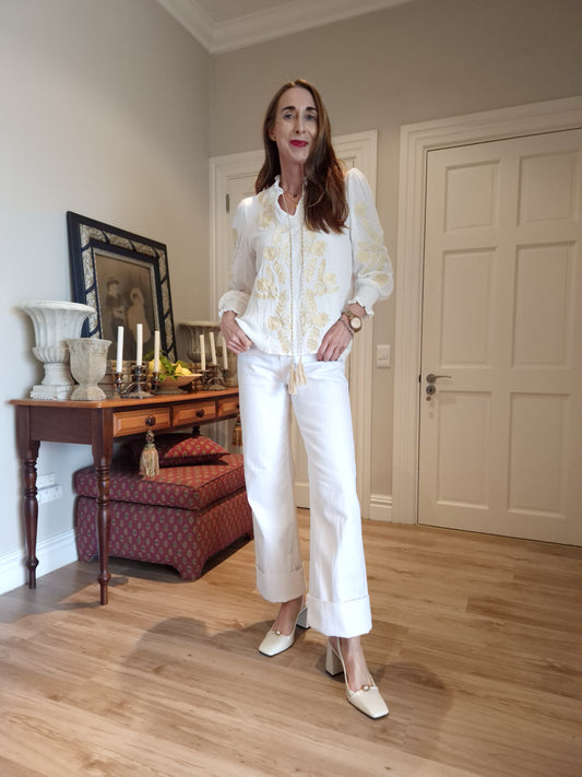 Blouse with stone embroidery detail and elasticated sleeve.